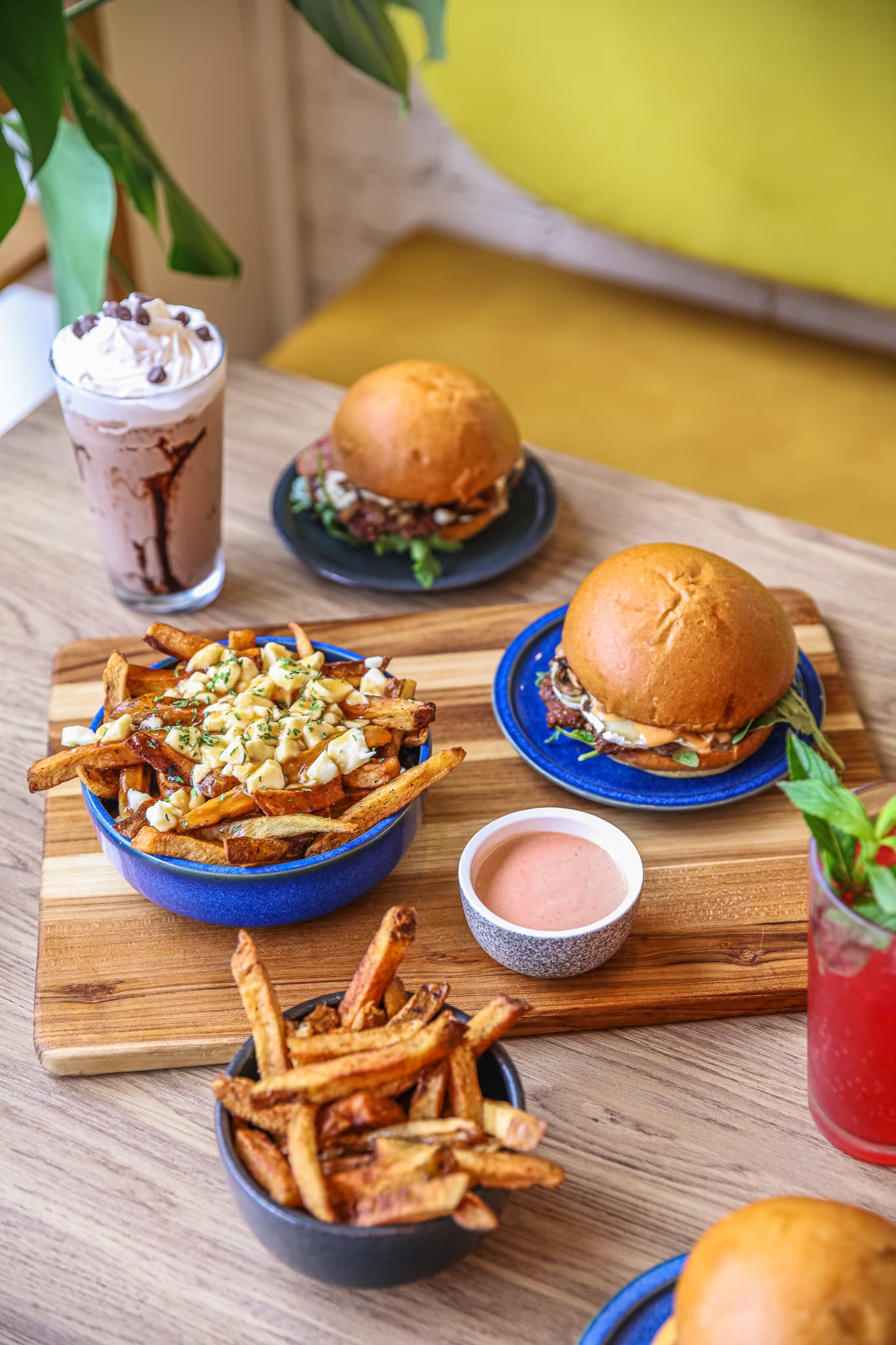 JOYO Burger Restaurant in Montreal - Happy Customers Enjoying Smash Burgers